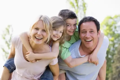 Smiling family at dental clinic